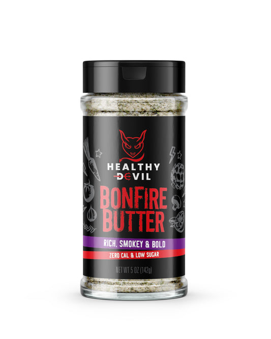 5oz Shaker of Healthy Devil Bonfire Butter seasoning, with the subheading “Rich, Smokey & Bold; Zero Cal & Low Sugar”. The label shows the company logo and text on a black background.