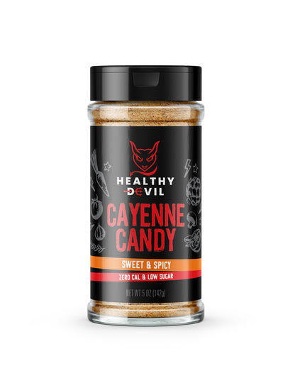 5oz Shaker of Healthy Devil Cayenne Candy seasoning, with the subheading “Sweet & Spicy; Zero Cal & Low Sugar”. The label shows the company logo and text on a black background.