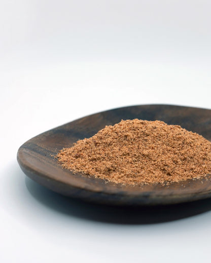 Close-up picture of Electric Lime seasoning on a wooden dish.